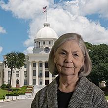Photo of B.J. Cochran with Alabama state capitol in background
