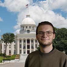 Photo of Clayton Maylin with Alabama state capitol in background