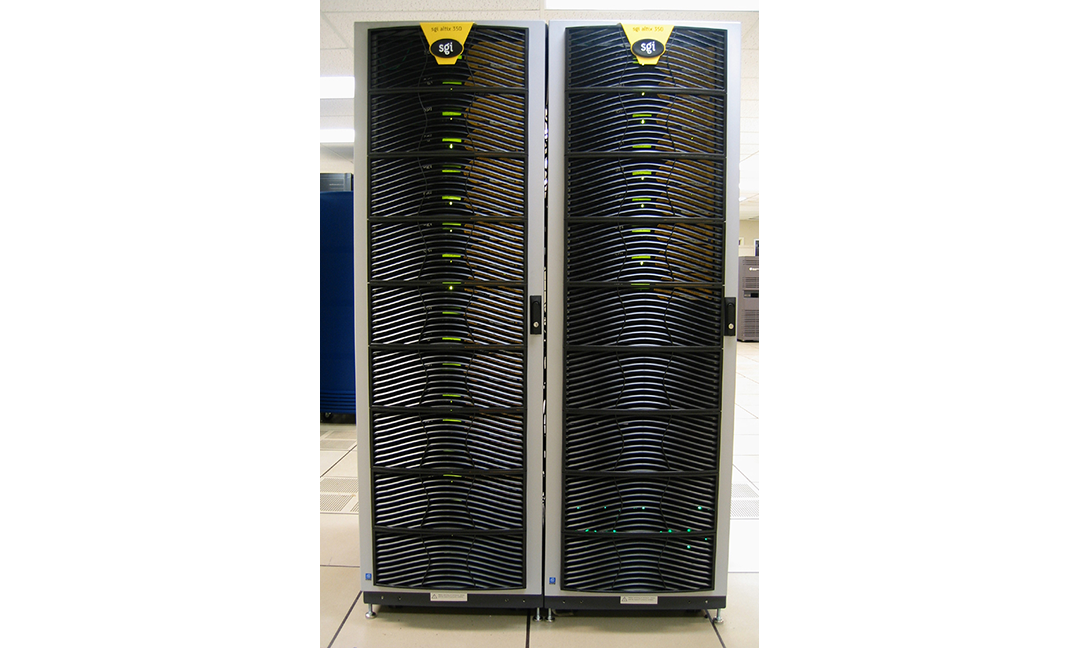 Front view of SGI Altix 350 supercomputer tower consisting of two side-by-side tall black and chrome cabinets in server room
