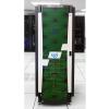A tall, vertical server rack for an SGI UV 2000 supercomputer. The front door features a distinctive green mesh pattern behind a white geometric overlay, with the blue "sgi" logo centered. The unit is standing on a tiled raised floor inside a data center, with other server racks visible in the background.
