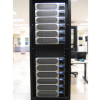 Front view of Cray XD1 tall black tower with silver and blue accents with blurred server room background
